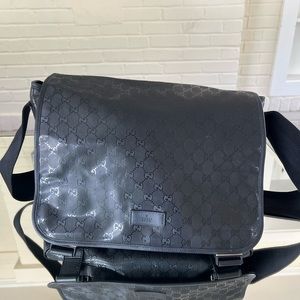 Black Gucci GG prime crossbody bag. Black Gucci diaper bag.